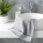 Serviette invite 30 x 50 cm eponge unie jacquard belina Gris