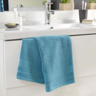 Serviette de toilette 50 x 90 cm eponge unie tendresse Bleu Paon